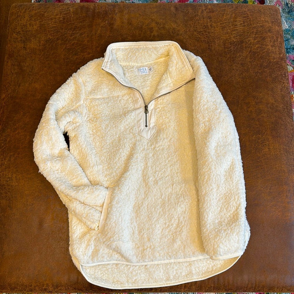 Small cream colored sherpa